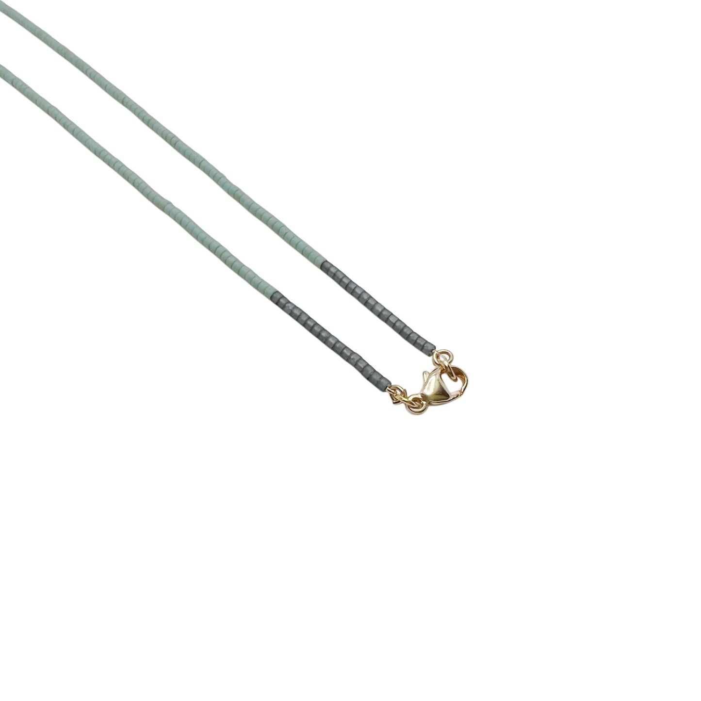 【helena rohner】miyuki beads necklace with tiny gold plated brass drop_mint