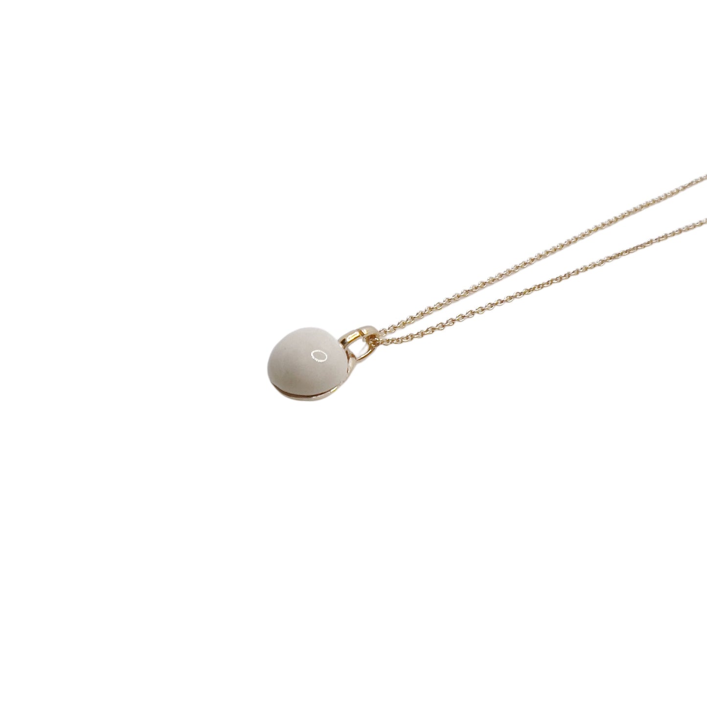 【Helena Rohner】tiny ceramic egg gold plated brass pendant_ecru