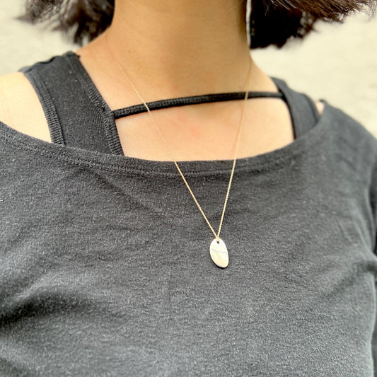 【Helena Rohner】flat organic shaped silver pendant on gold plated brass chain