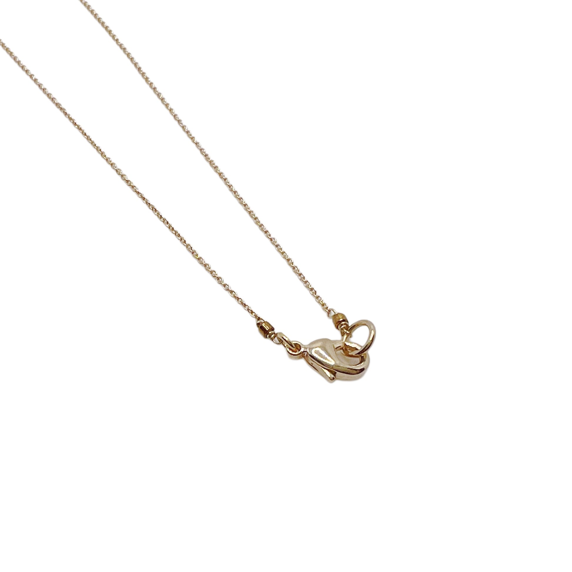 【Helena Rohner】flat organic shaped silver pendant on gold plated brass chain