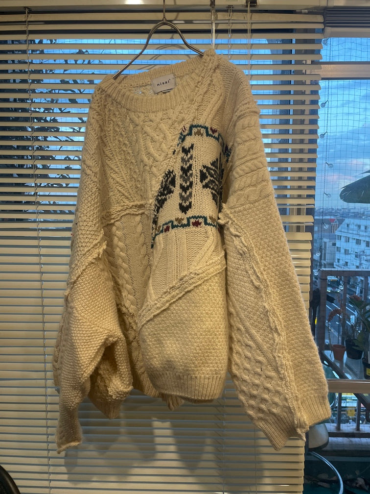 【nisai】生成りのつぎはぎのオーバーニット